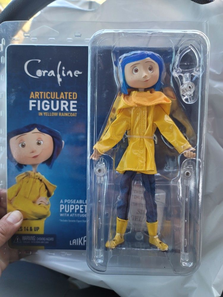 CORALINE ARTICULATED FIGURE IN YELLOW RAINCOAT