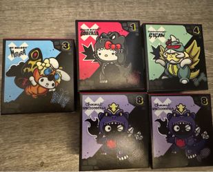 Hello kitty x Godzilla toys