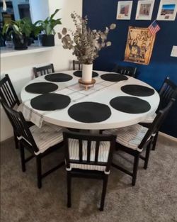 Round Table with 8 Ikea Chairs and Cushions
