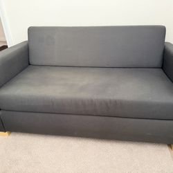 Mini sofa, Folds Down To A Small Bed. 