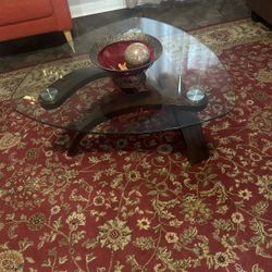 Gorgeous, brown coffee table with glass top
