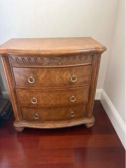 Set of 2 nightstands, a classic three-drawer dresser, characterized by its traditional French Provincial or Louis Philippe influence.