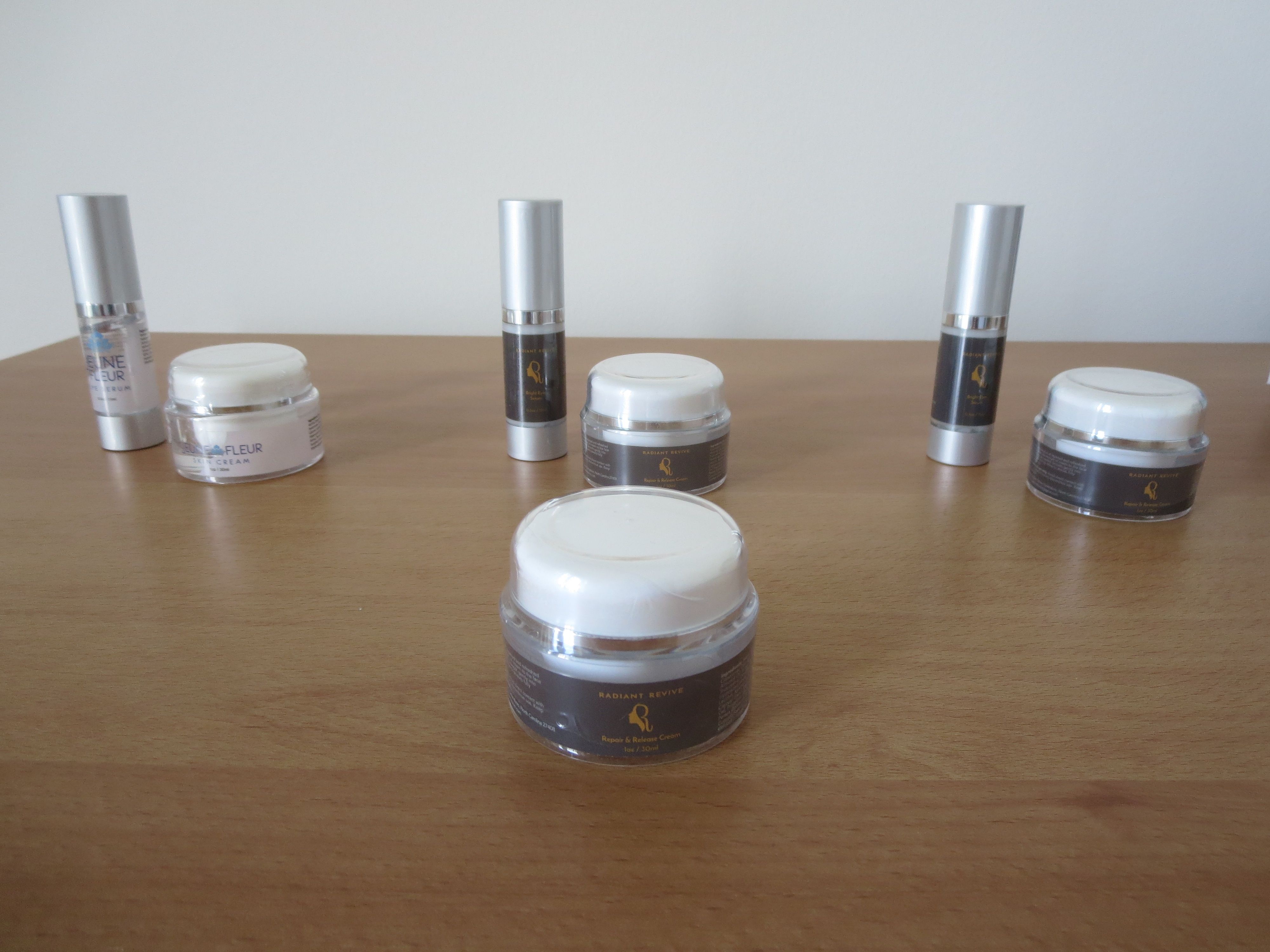 RADIANT REVIVE & JEUNE FLEUR Anti-Aging Cream + Serum. 7 pcs total (3 Serums, 4 Creams). Originally paid over $311. Brand new, sealed/wrapped.