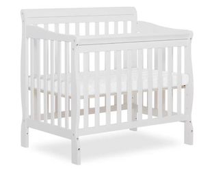 White mini crib