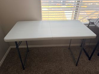 Table 46x23 inches with adjustable and foldable option