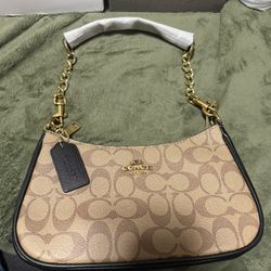 Coach Teri Shoulder Bag in the classic black/brown signature canvas