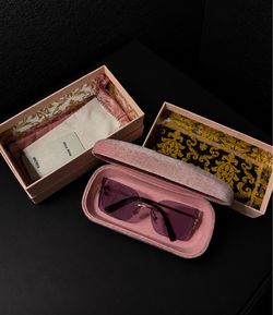 MIU MIU glasses