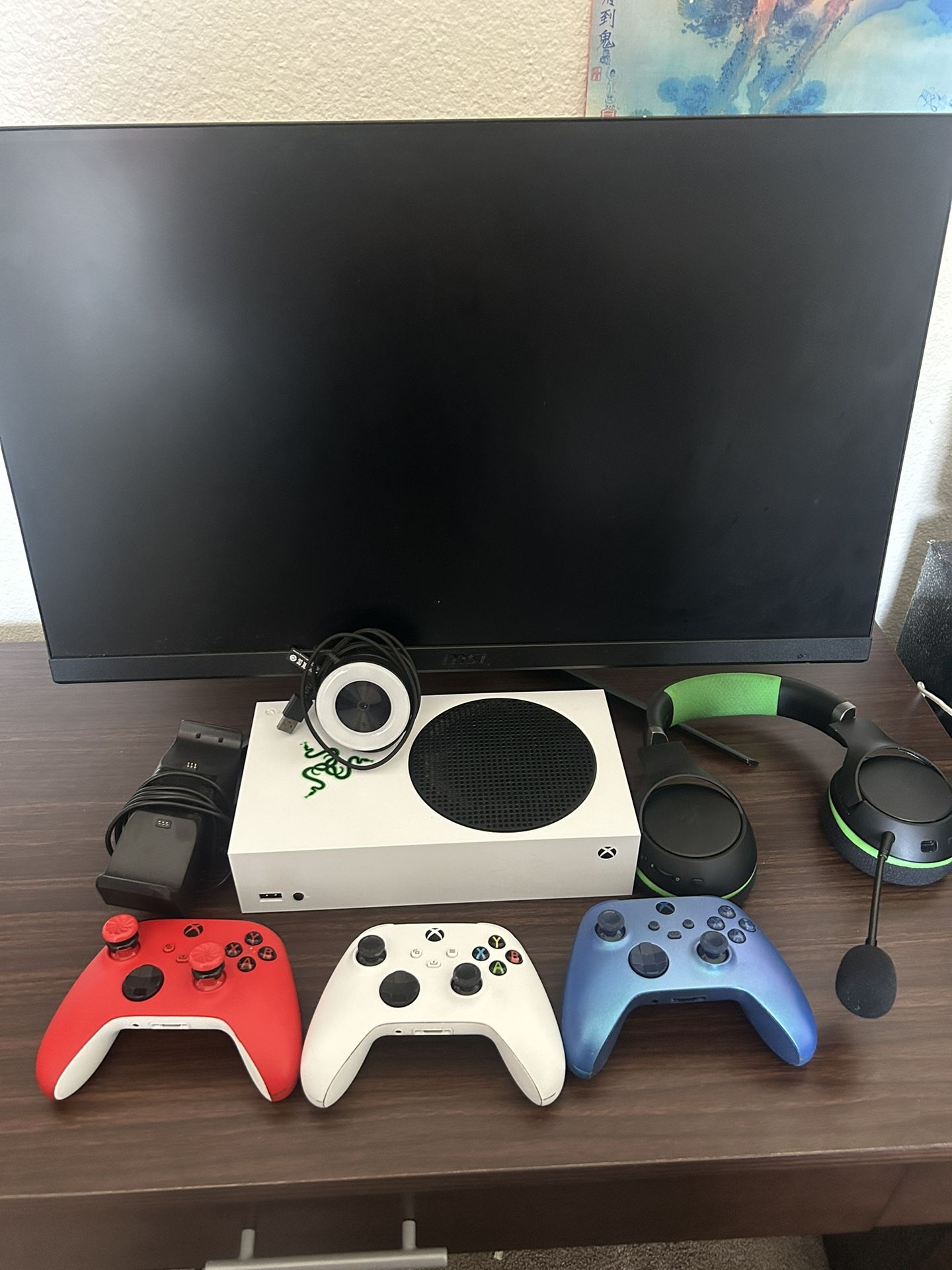 Xbox Series s with 3 controllers, monitor, and headset