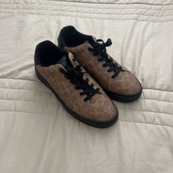 Coach brown sneakers with repeating beige logo pattern #coach #designer