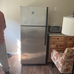 Standard Size Fridge Freezer. Great Condition. Few Dents On Door 