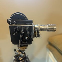 Bolex 16 mm  Very good condition for its age comes with a few extras also paired with. Correct heavy German tripod.   $1000