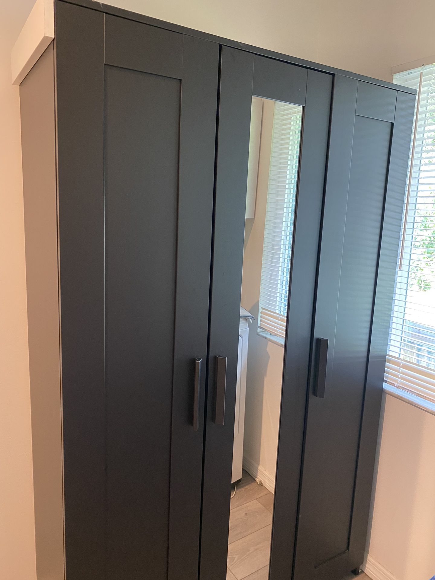 Ikea BRIMNES Wardrobe with 3 doors, black, 46x74 3/4 ". Nice condition.