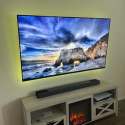 TV MOUNT SOUND BARS AN TV STAND 