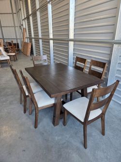 Bayside Furnishings
Brinley 7-piece Dining Table Set
Rubberwood and Poplar Solids with Ash Veneers
Hand-Applied, Multi-Step Finish
18-Inch Self-Storin
