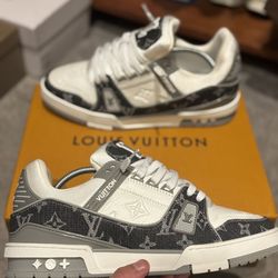 Louis Vuitton LV Trainer sneakers in the Monogram denim colorway.  Sizes :8,9,11