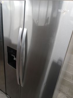 Whirlpool stainless steel side by side refrigerator - Free delivery