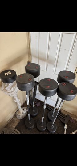 Commercial straight bars 75-100lbs weights 525lbs total