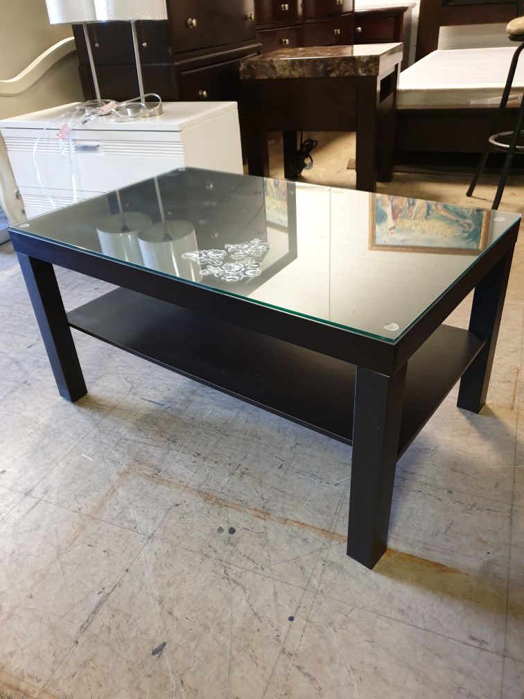 Coffee table solid wood top glass 35.5'×21.5' height 18' in excellent condition