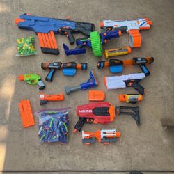 Nerf guns and bullets and attachments to guns 