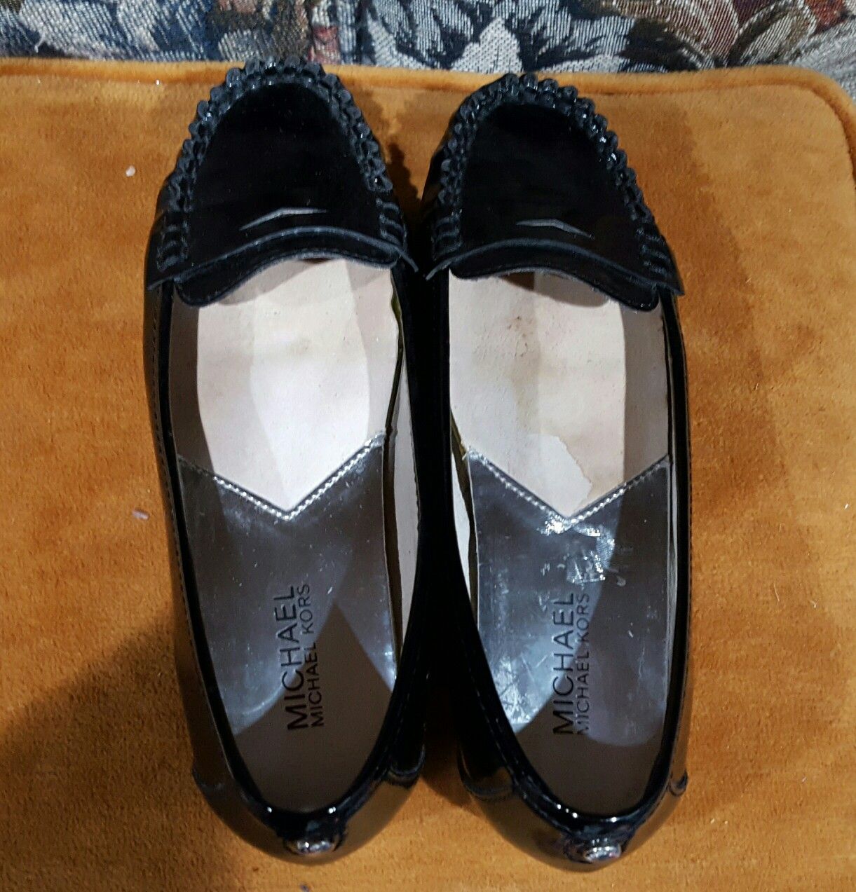 Michael Kors black penny loafer style shoes