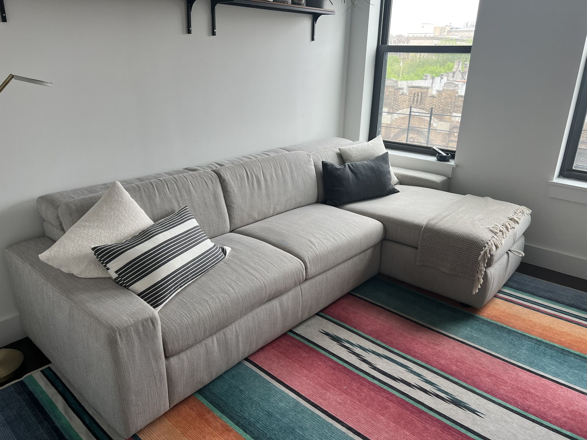 Originally $2800 Enzo 3 Piece Sleeper Sectional W/Chaise And Storage
