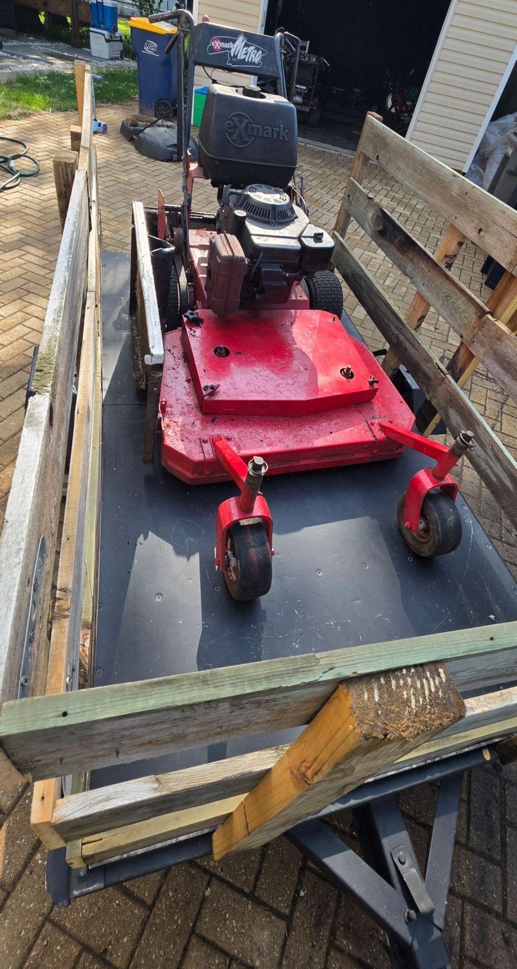 Commercial Walk behind lawnmower and 4x8 trailer