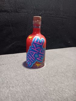 Bottle Of Shimmery Liquid