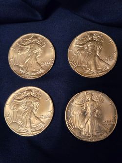 Lot of 4 - 1987 American Silver Eagle