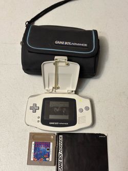 Nintendo GameBoy Advance AGB-001 console system with carrying case and 2 games.