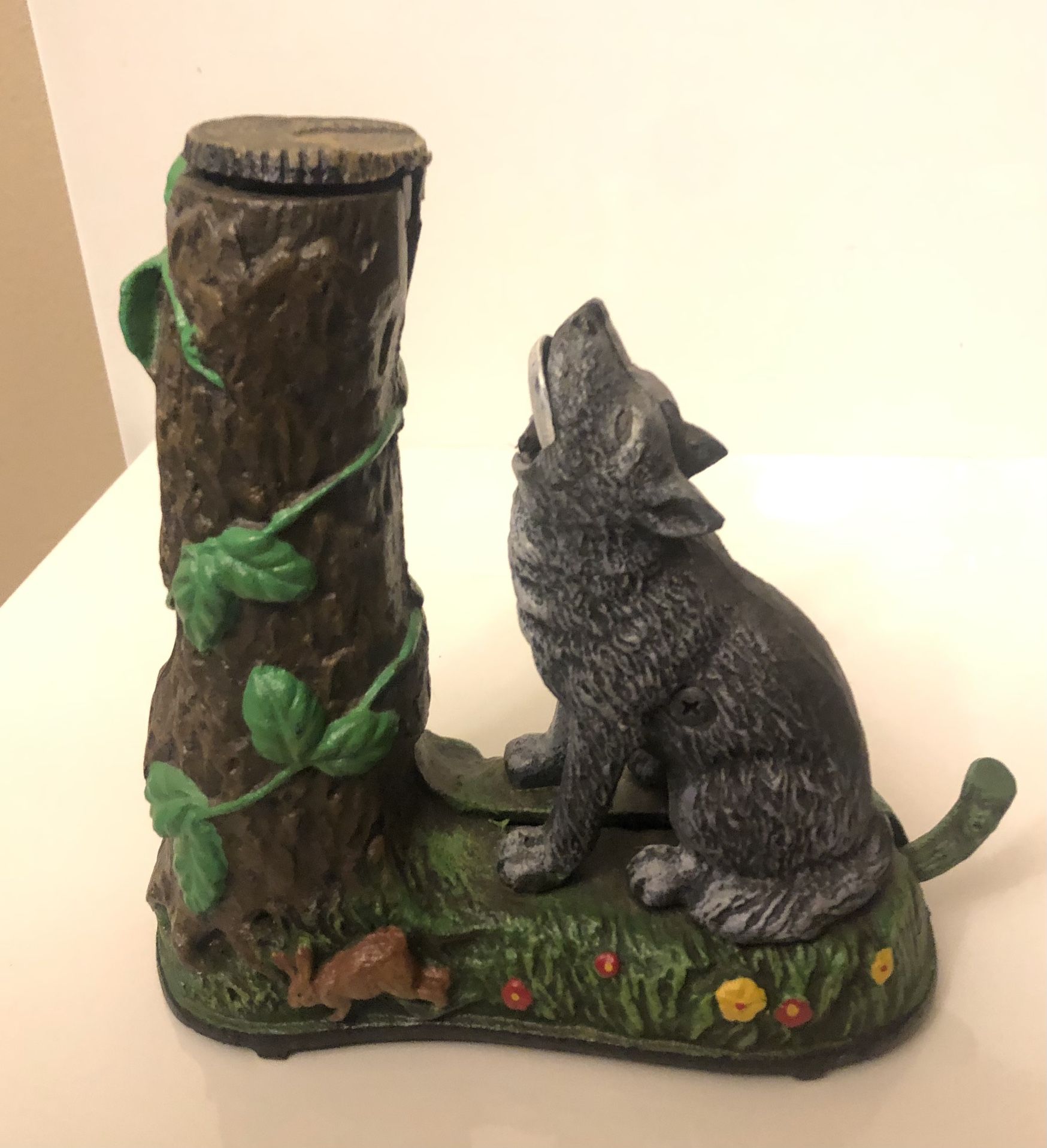 Mechanical wolf and squirrel cast iron bank