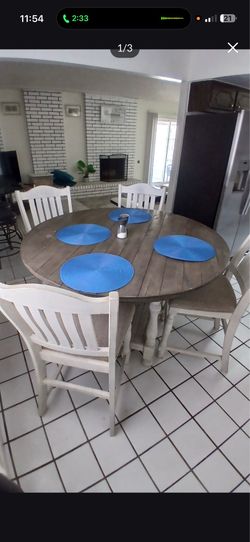 Round rustic Farmhouse  table with 4 comfortable chairs, WILLING TO TRADE, offer up!
