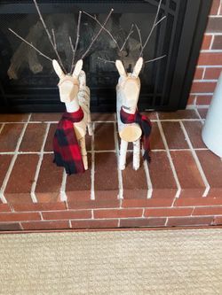 Two small birch handmade reindeers
