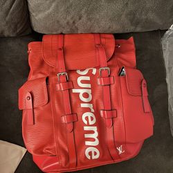 LV Supreme book bag  