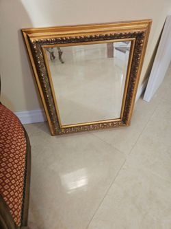 Gold ornate mirror