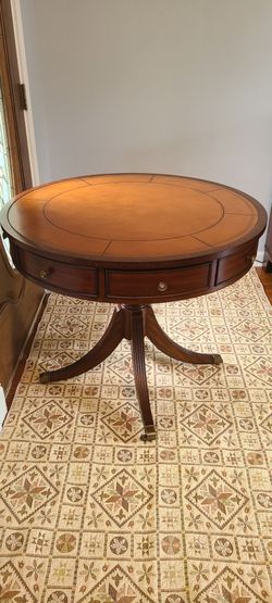 Ethan Allen round table with leather top
