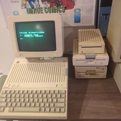 Apple 2c IIc works great! One unidisk 3.5 and 5.25 drive Apple 2 ll II llc IIc