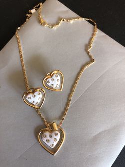 Juego de cadena y aretes
