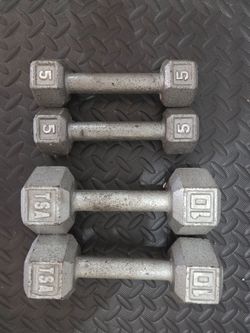 Dumbells pairs 2 x 10lbs and 2 x 5lbs