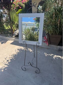 Picture frame stand with mirror