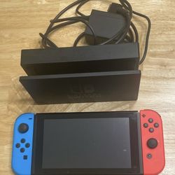 Nintendo Switch w/ Games (pictured) Included