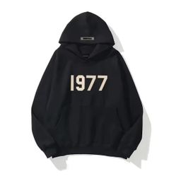 Black 1977 Fear of God Essentials Hoodie