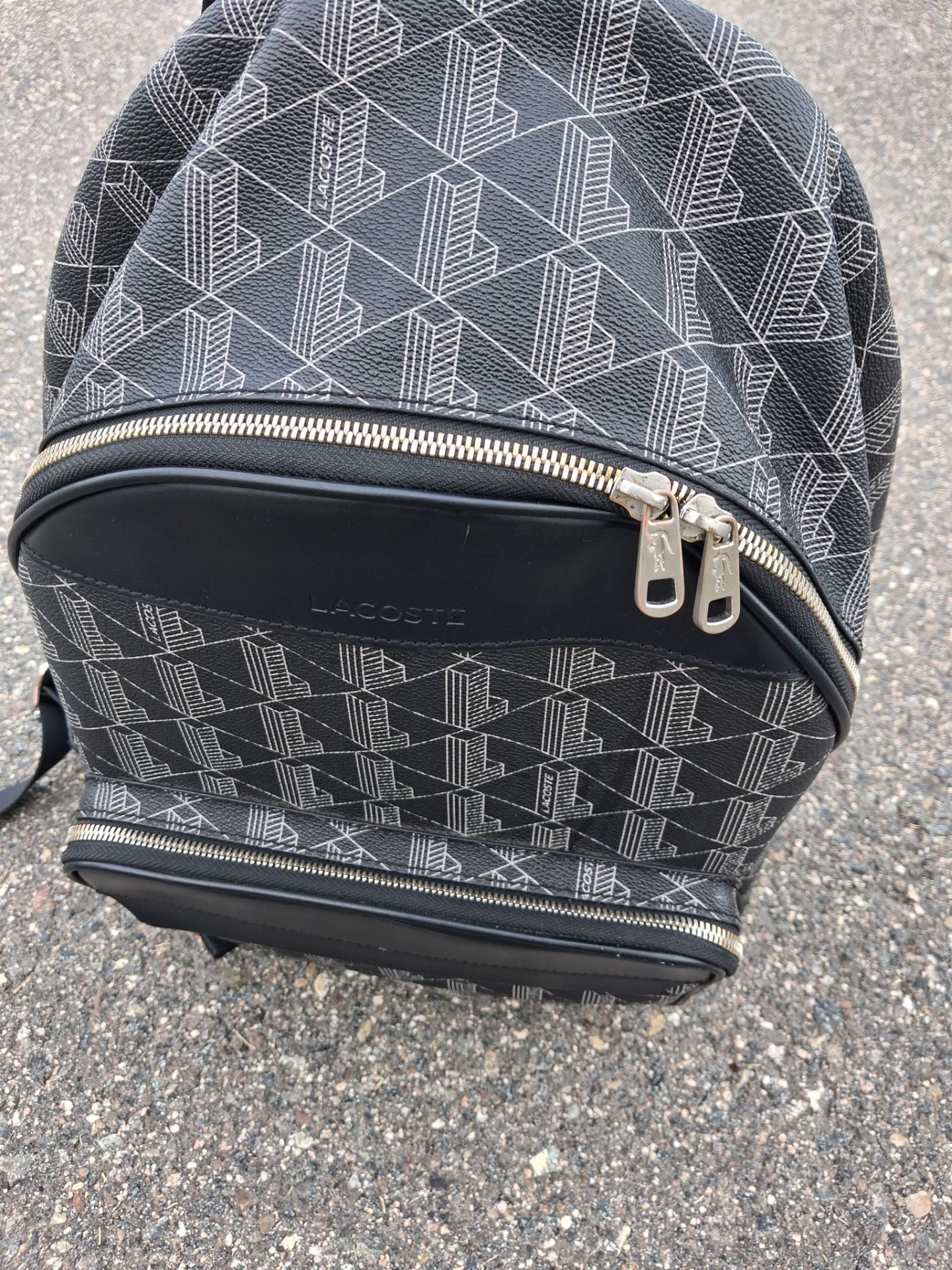 Lacoste men's designer fashion bag used black pattern backpack leather