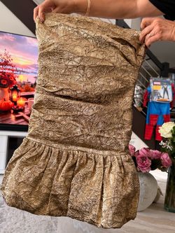 Nadine Merabi gold dress