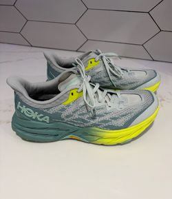 Hoka women’s sneakers 9B