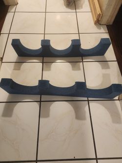 Scuba tank holders