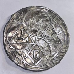 A large puchout of the free masons silver like coin Antique
