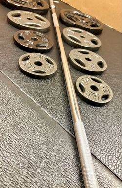 Standard Steel 6 ft Brand New Bar with pair of Cast Iron Plates of 25#, 10# , 5# and 2.5 pounders. Brute Weight: 105#