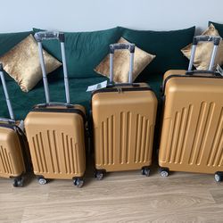 New Never Used 4  Suitcases 