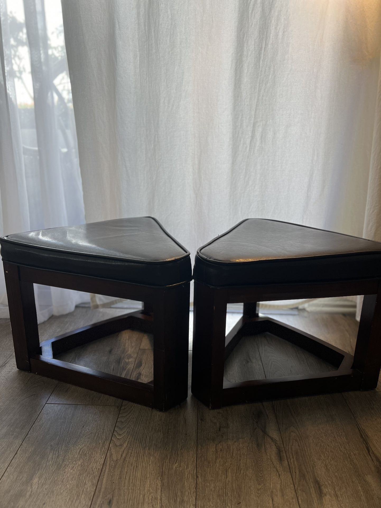 Two Leather Ottomans Stools