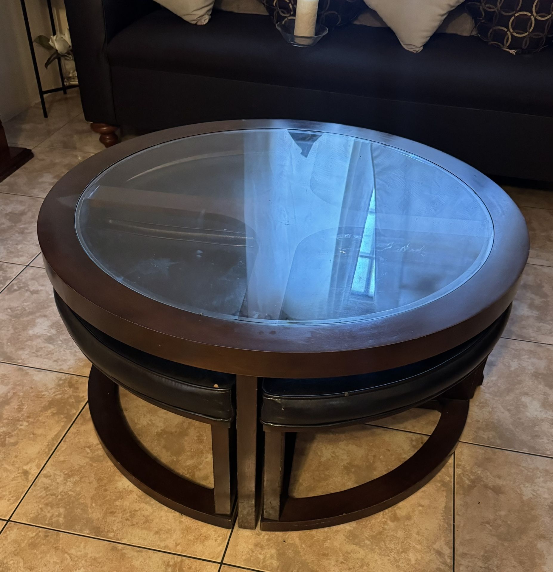 Small round table with pull out stools